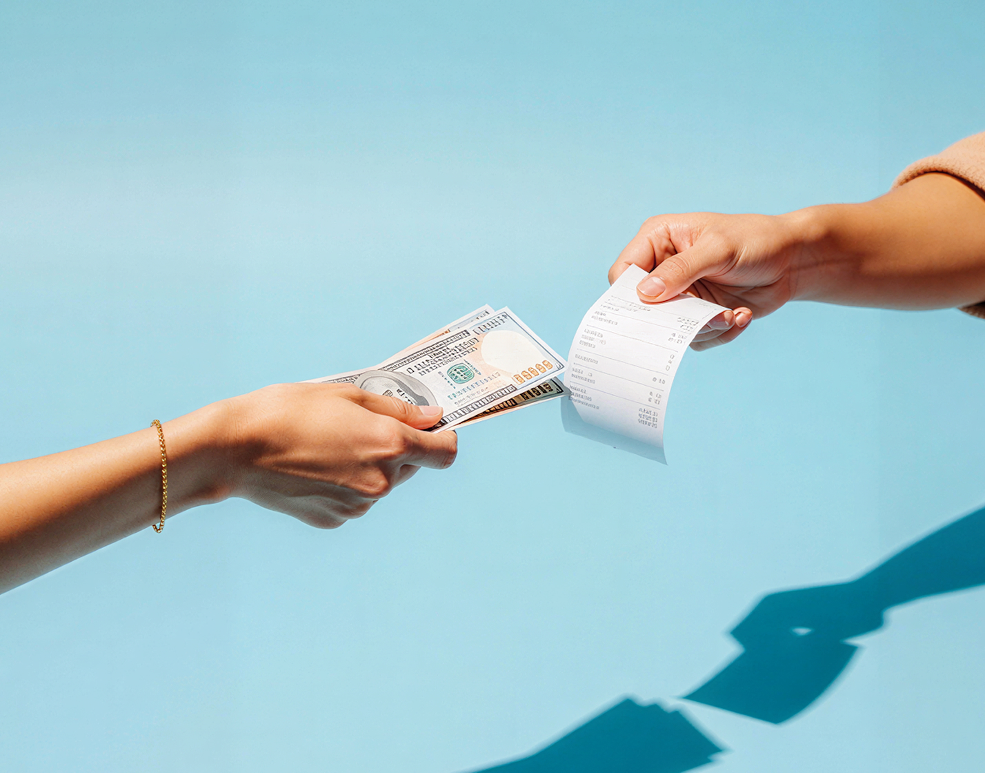 Hands exchanging a crypto donation receipt